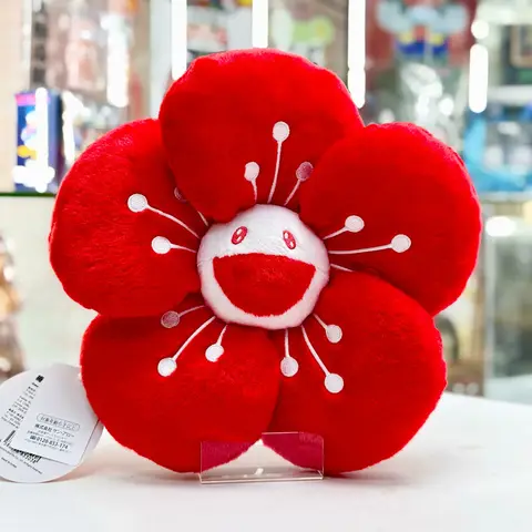 Cojín Takashi Murakami Flower de 28cm, edición Ume Kijyaku Tei Ver., con el motivo de flor sonriente colorido.