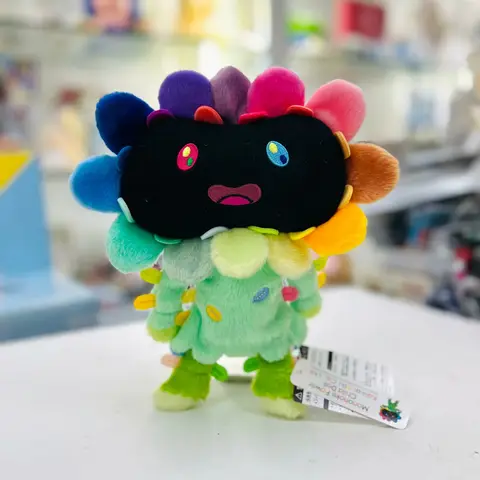 Muñeca Takashi Murakami Mononoke Flower Child, 26cm, representando un personaje estilizado con flores de colores.